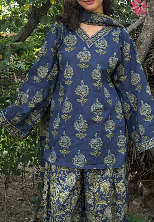 Vasudha hand block Kalamkari cotton kurta set in navy and gold with matching salwar and dupatta — outdoor lifestyle front view