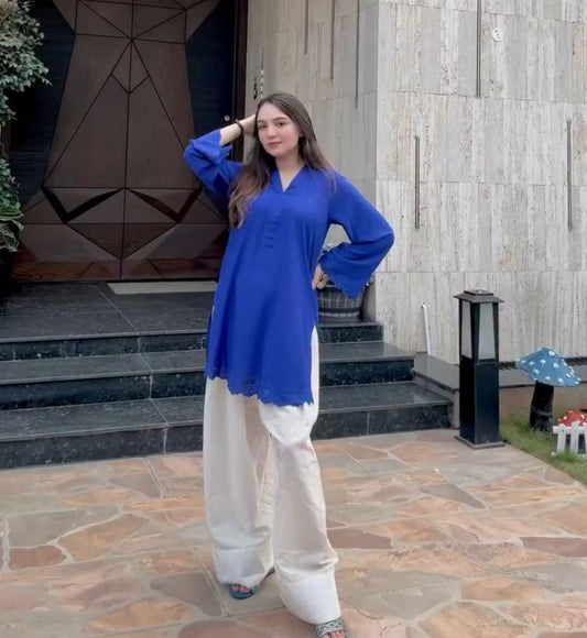 Inara embroidered crepe kurta with cotton farsi salwar — cobalt blue kurta with tonal embroidered cuffs and ivory farsi salwar, front view
