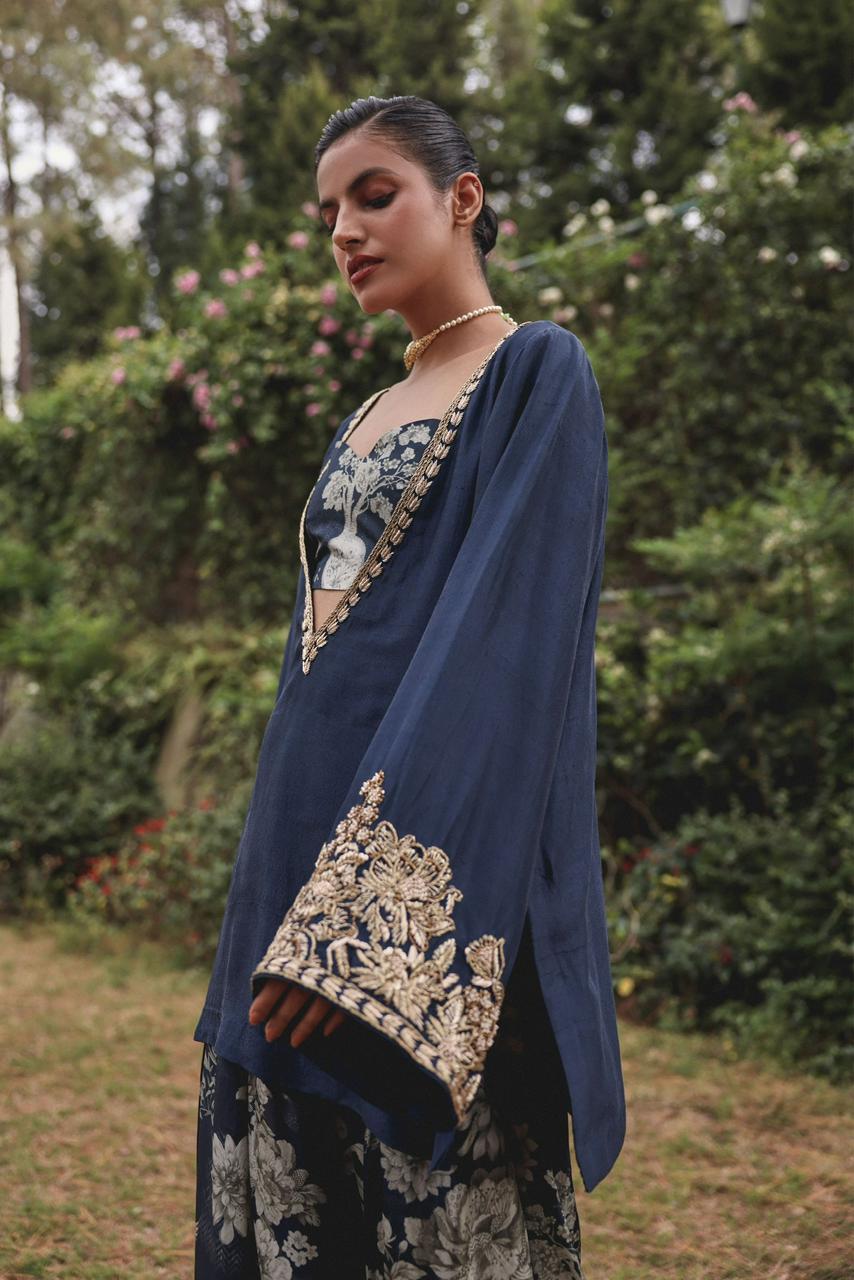 Shajar block-printed cotton modal festive set — navy kurta with gold embroidered neckline, tree-of-life printed bralette and farsi salwar, full look front view