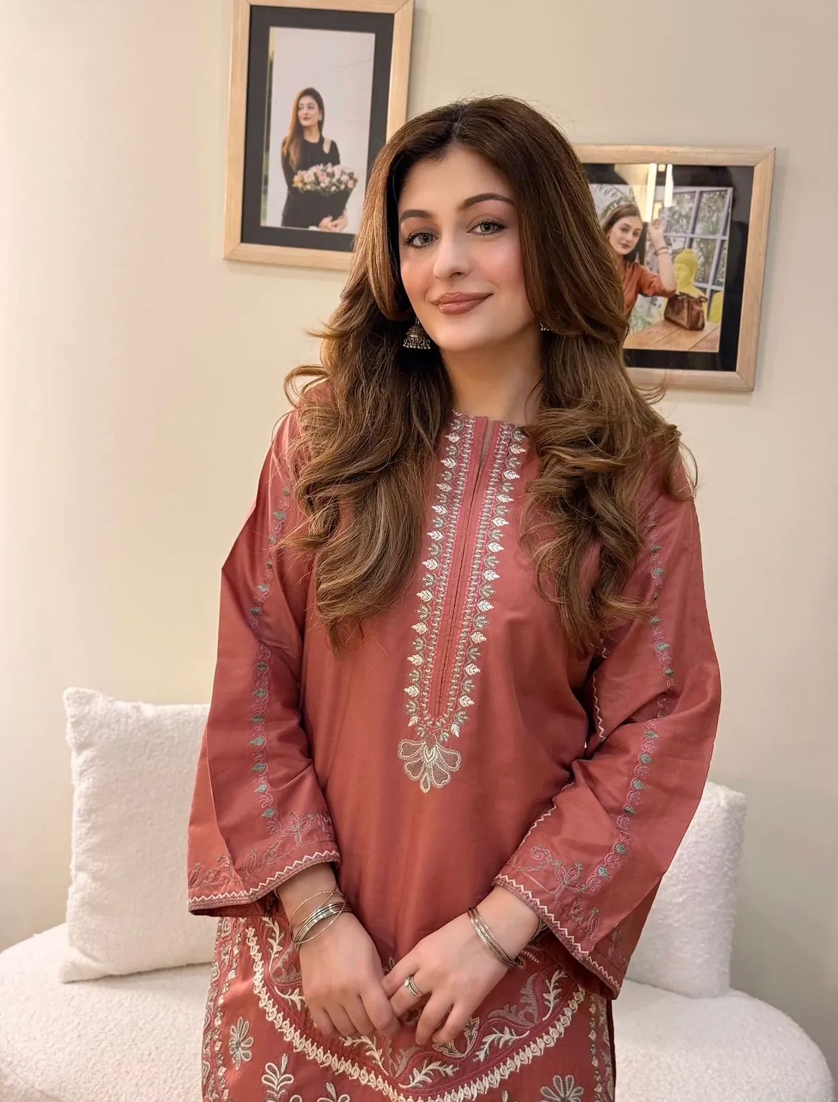 Close-up of embroidered front panel and scalloped hem on the Gulrang cotton modal kurta in dusty rose