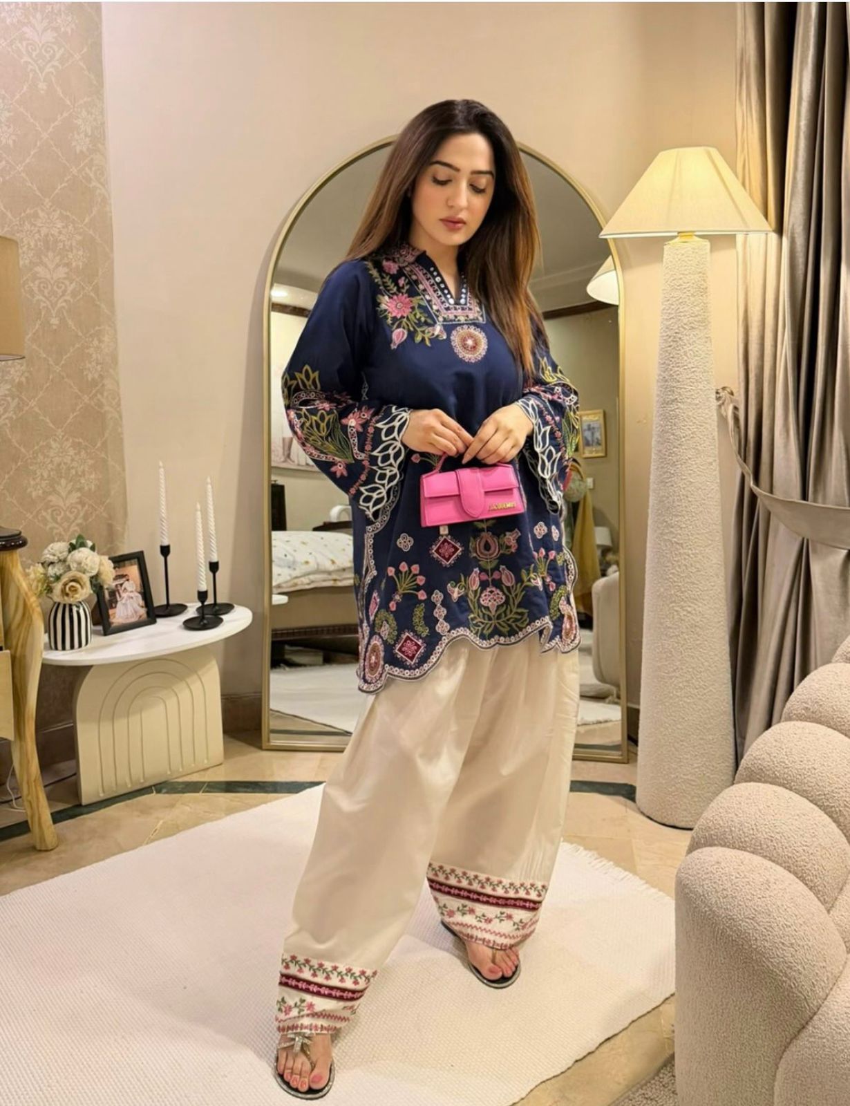 Roohi navy blue kurta set styled with cream embroidered salwar and pink mini bag — mirror selfie lifestyle shot